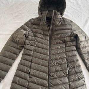 Women’s dark olive packable coat.